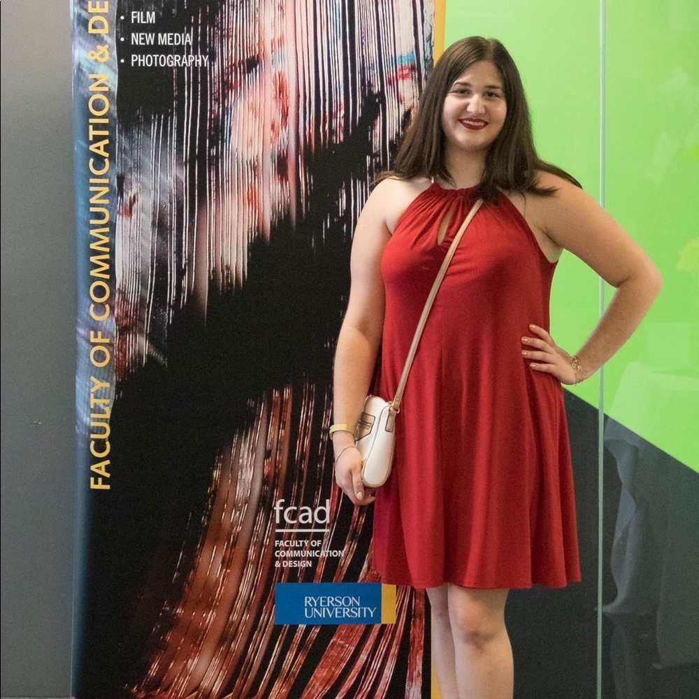 Red sleeveless dress with gold chain neck